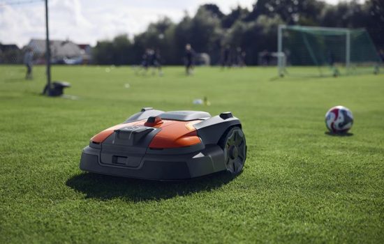 husqvarna automower on a soccer field